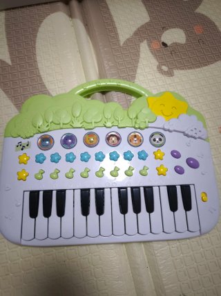 Piano infantil musical con animales
