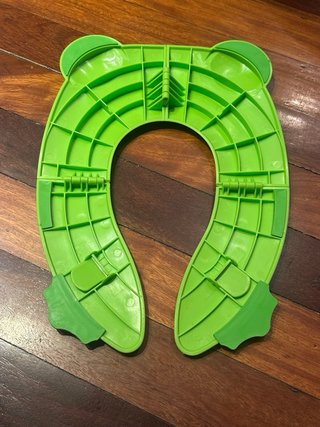 Asiento de inodoro plegable para niños