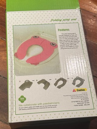 Asiento de inodoro plegable para niños
