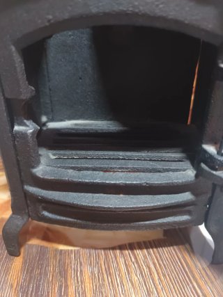 Mini estufa decorativa de hierro fundido