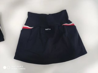Conjunto deportivo tenis negro y rojo