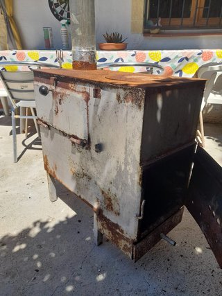 Estufa leña antigua con horno