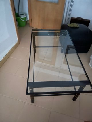 Mesa cristal negra patas bambú también se eleva de