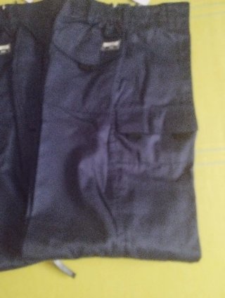 Pantalones de trabajo con etiqueta T-38 y T-40