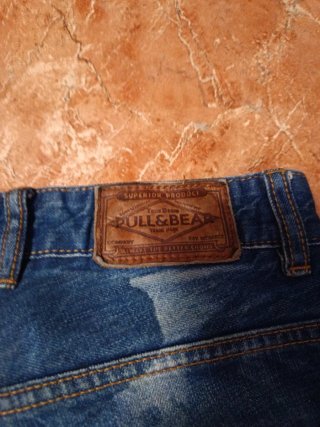 Vaqueros hombre azules desgastados