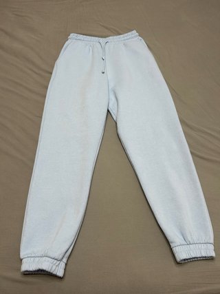 Pantalón chándal con bolsillo azul claro
