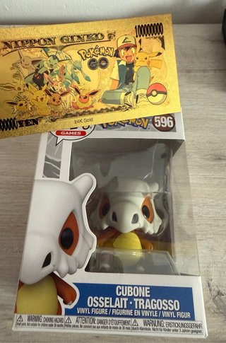 Funko Pop! Pokémon Cubone + Banconota d'Oro