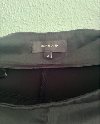 Pantalones anchos negros River Island Talla M