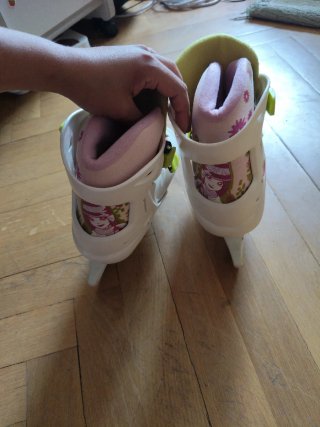 Pattini di ghiaccio per bambini bianchi e rosa