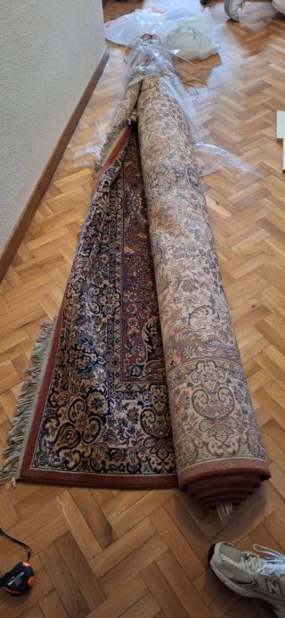 Alfombra grande de lana y tela