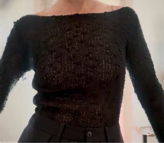 Jersey negro escotado manga larga
