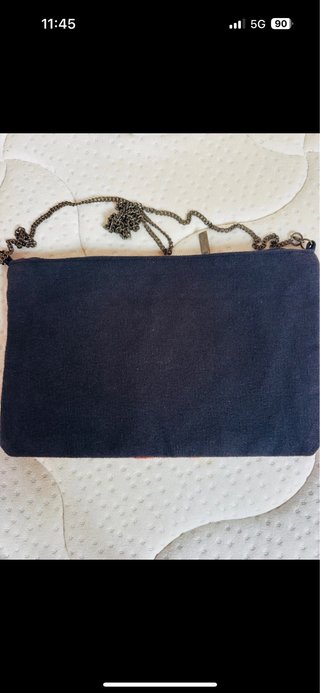Bolso de mano con abalorios y diseño étnico