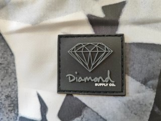 Neceser Diamond Supply Co. estampado