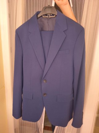 Traje de chaqueta y pantalón azul