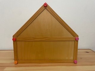 Casa de muñecas de madera