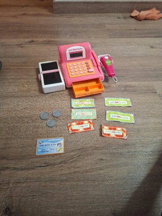 Caja registradora de juguete rosa