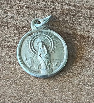 Lote 11 medallas religiosas bifaciales, años 50