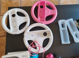 Nintendo Wii con muchos accesorios