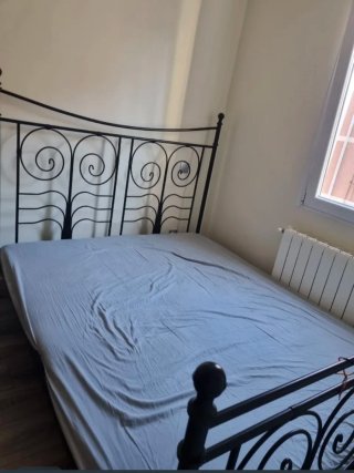 Cama de forja negra Ikea