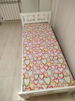 Cama infantil Ikea blanca con barrera