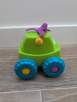 Fisher-Price Coche Monstruito verde, juguete gateo
