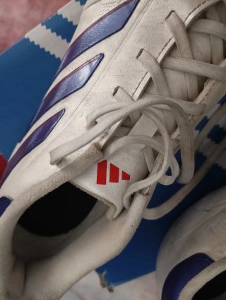 Zapatillas Adidas tacos blancas y azules