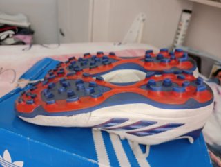 Zapatillas Adidas tacos blancas y azules