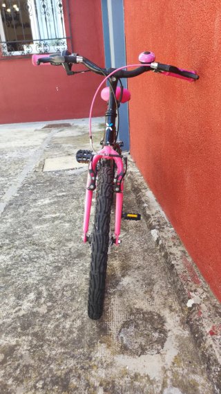 Bicicleta niña rosa y negra