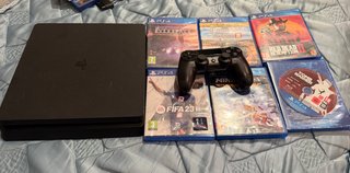 PS4 Slim 1TB + 6 Juegos