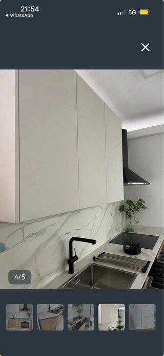 Cocina de exposición madera y mármol