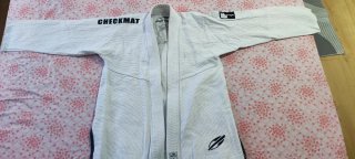 2 kimonos Jiu Jitsu tatami y momaii