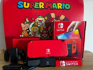 Nintendo Switch OLED Edición Mario Roja COMO NUEVA
