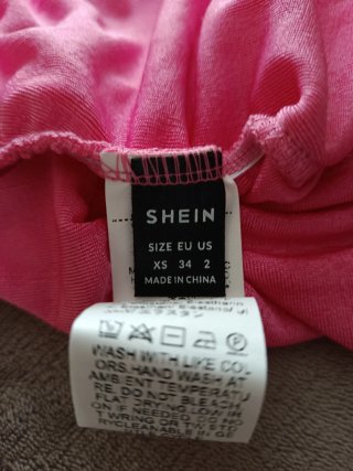 Top multiposicion rosa talla Xs