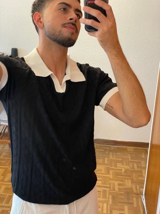 Polo negro hilo talla XS (equivale S/M)