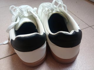 Zapatillas blancas y negras Unisex