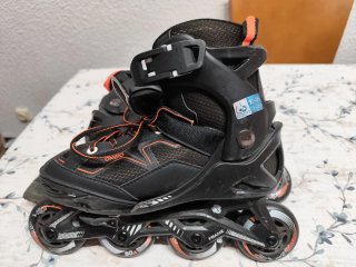 Patines en línea Oxelo negros y naranjas