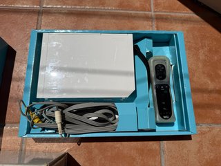 Nintendo Wii + Wii Sports Resort