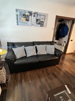 Sofá de piel negro/ dos juegos de sofas