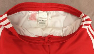 Pantaloncino Adidas rosso con strisce bianche