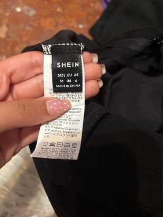 Pantalón campana negro cremallera