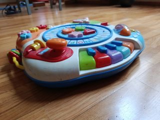 Juguete musical para bebé con letras y piano