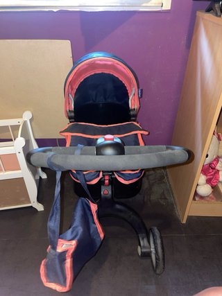 Carro de muñecas azul y rosa