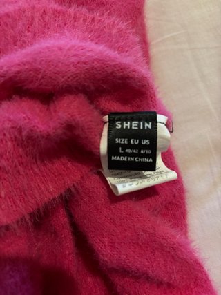 Jersey rosa mujer cuello alto peludo