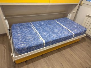Cama abatible con armarios