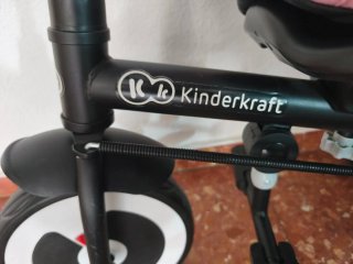 Triciclo infantil rosa con capota