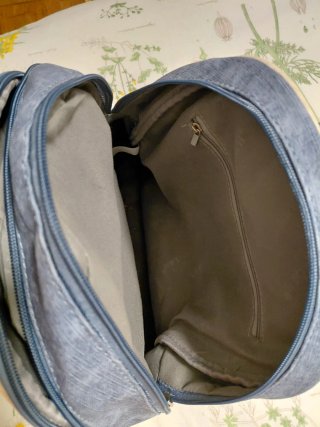 Mochila azul y beige