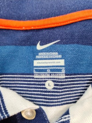 Polo a maniche corte Nike ragazzo a righe - tg L