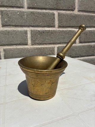 Mortaio e pestello in bronzo