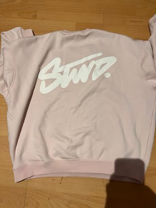 Sudadera rosa con logo pequeño