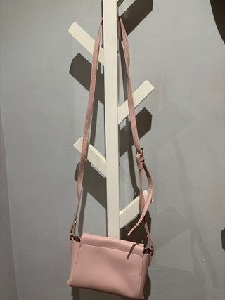 Bolso rosa bandolera